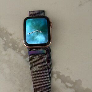 Apple iwatch series 5, rose gold casing, rainbow metallic strap and charger